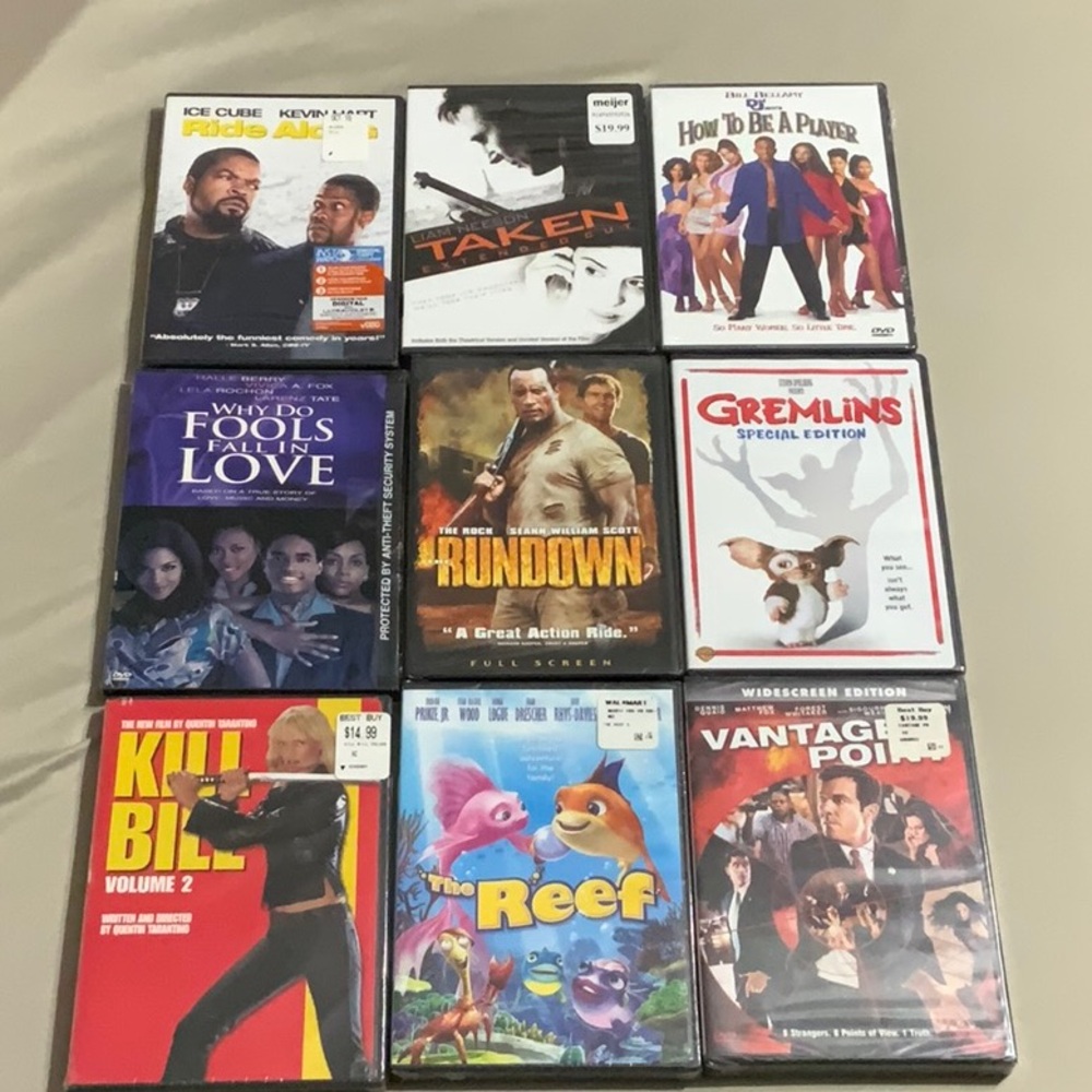 9 movies still all in plastic. 1 Price buys them all